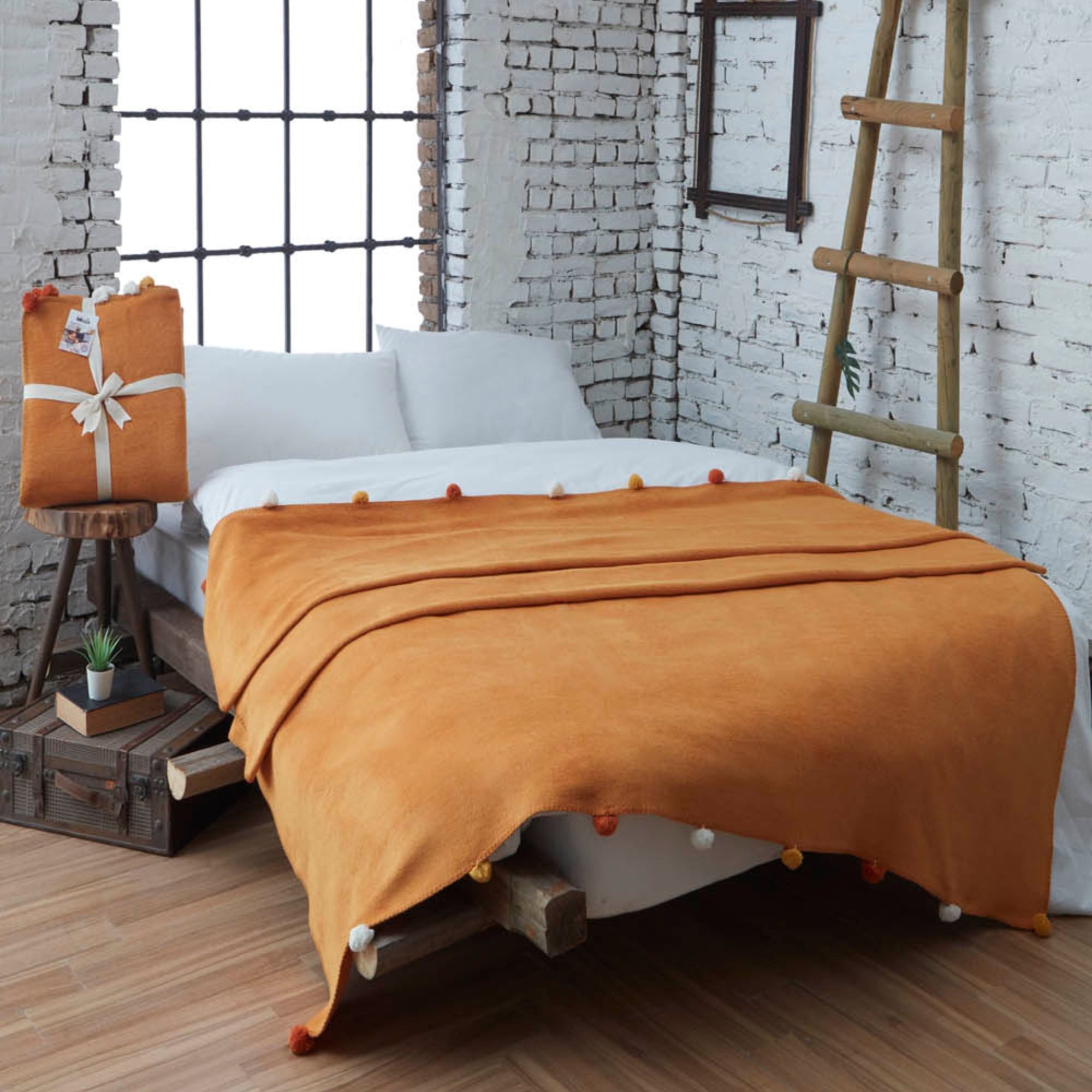 Mustard cotton blend blanket with pompoms, 170x100cm, boho style bed runner and sofa throw, Trimita collection.