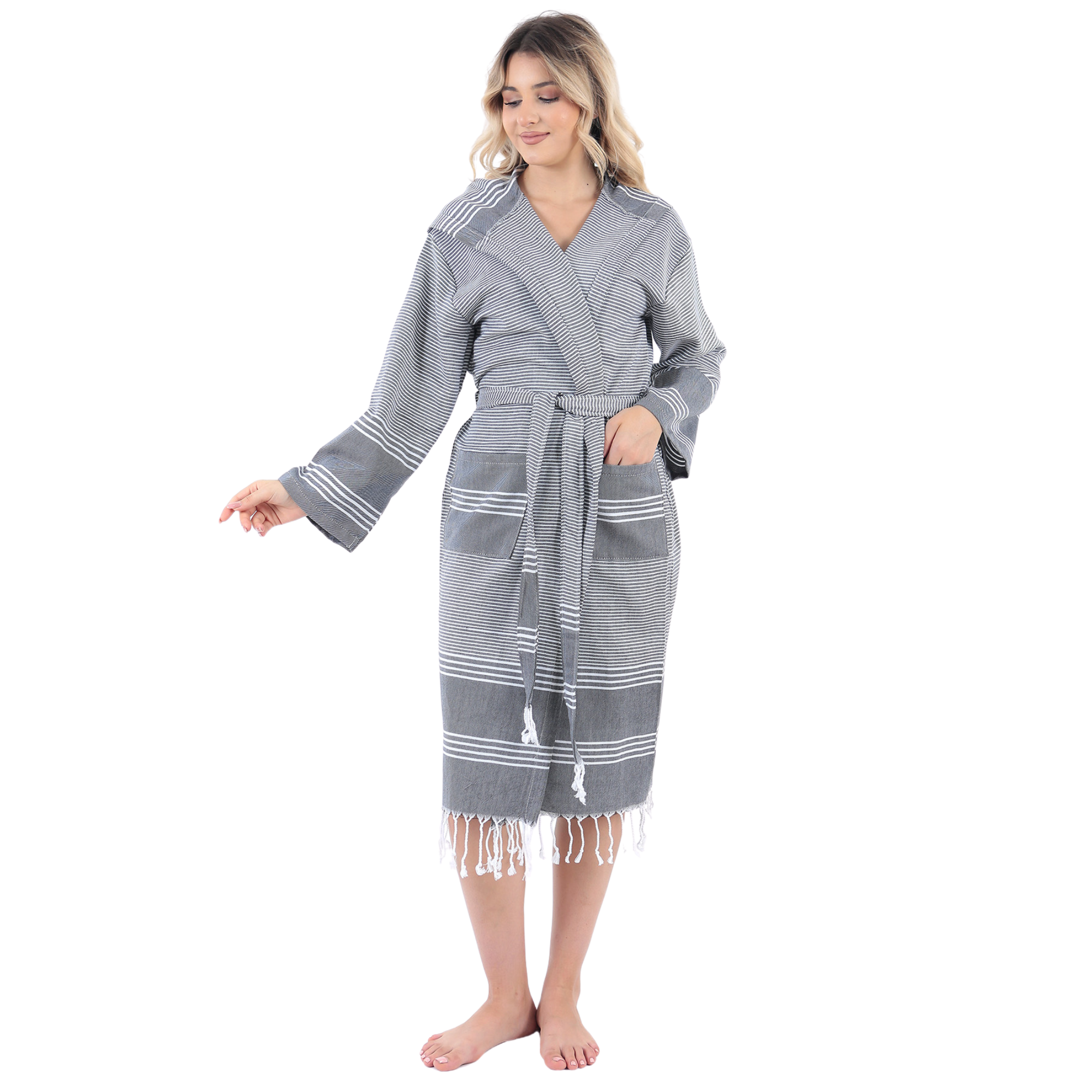 Premium black and white striped peshtemal bathrobe featuring decorative tassels.