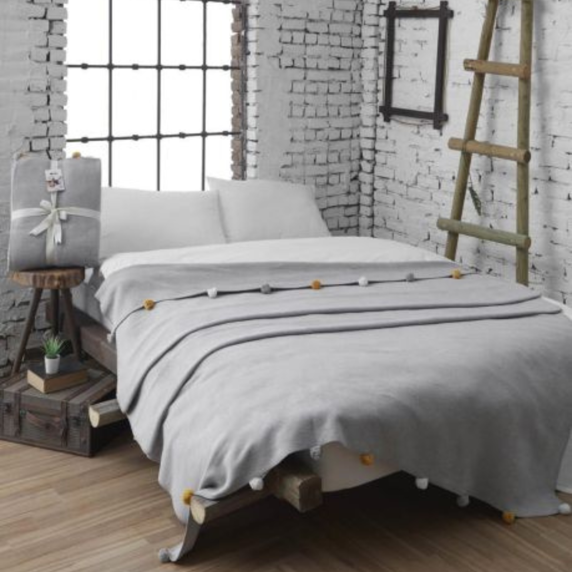 Couverture à pompons