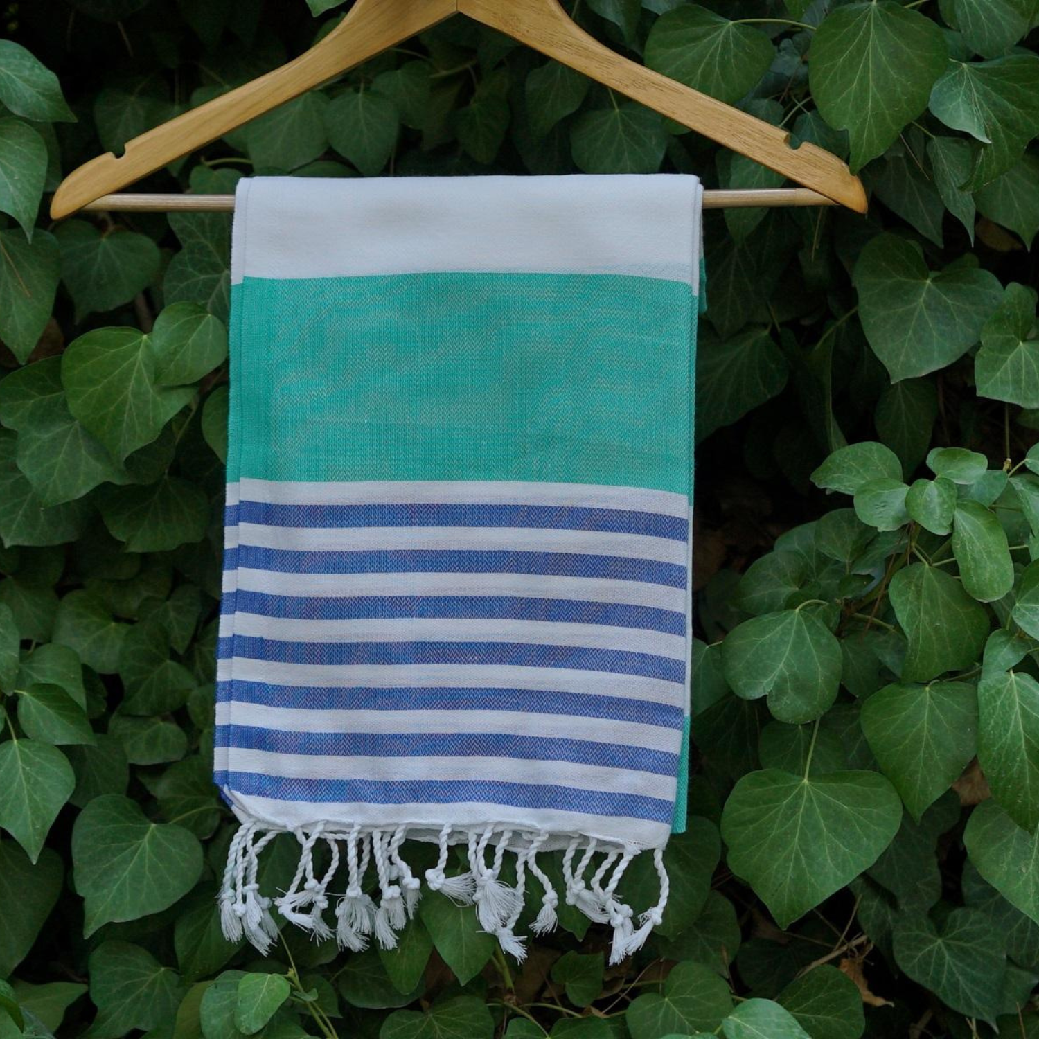Trendy green-navy blue striped towel.