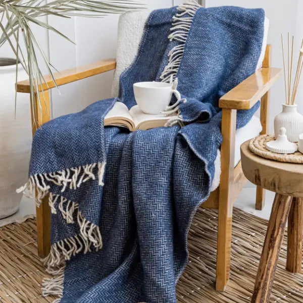 Soft pure wool sofa throw blanket in navy blue, Trimita sustainable home textile, ideal for sofa or bed.