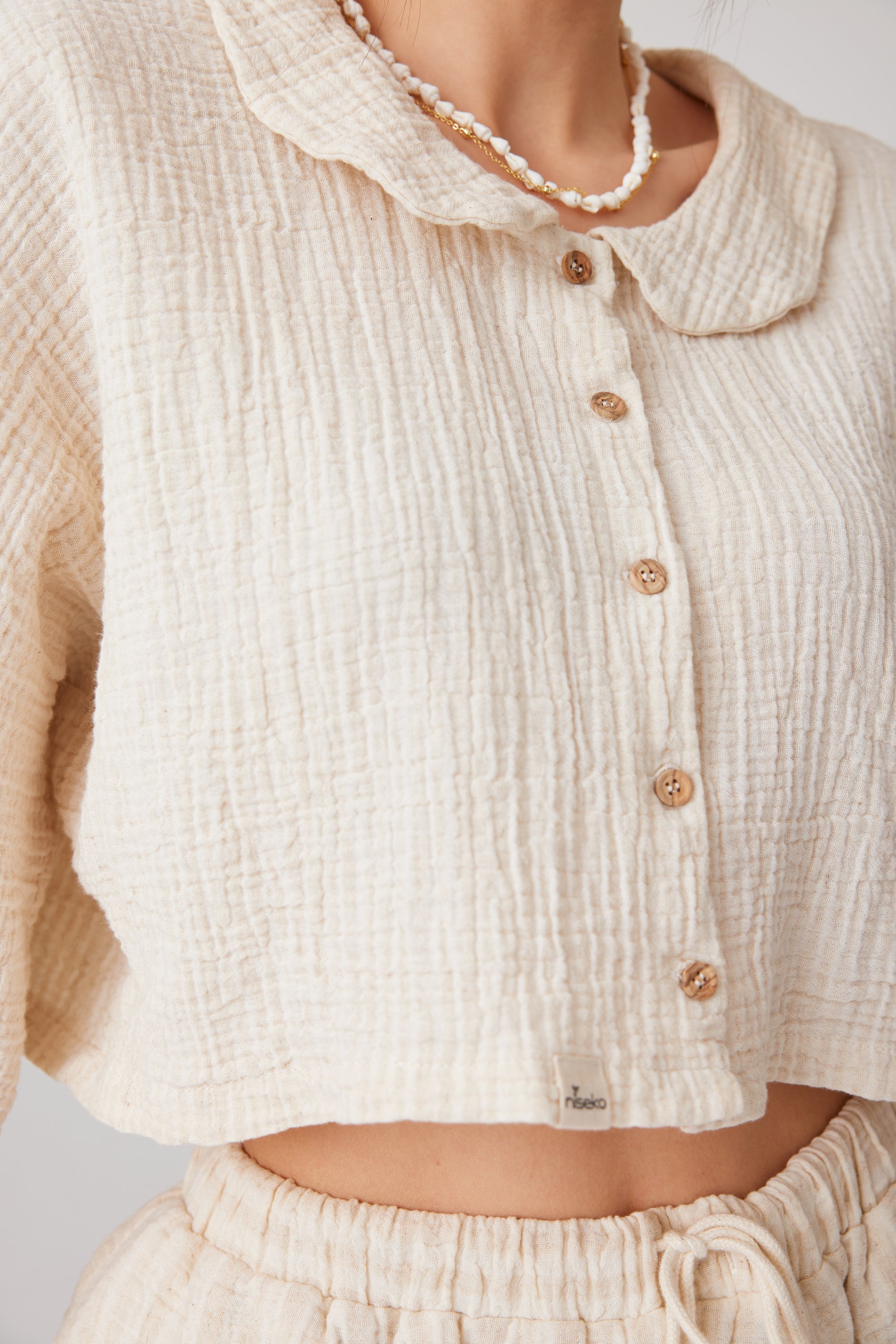 Effortless, cozy-chic look in a monochrome textured set—perfect for relaxed summer days or minimalist homewear