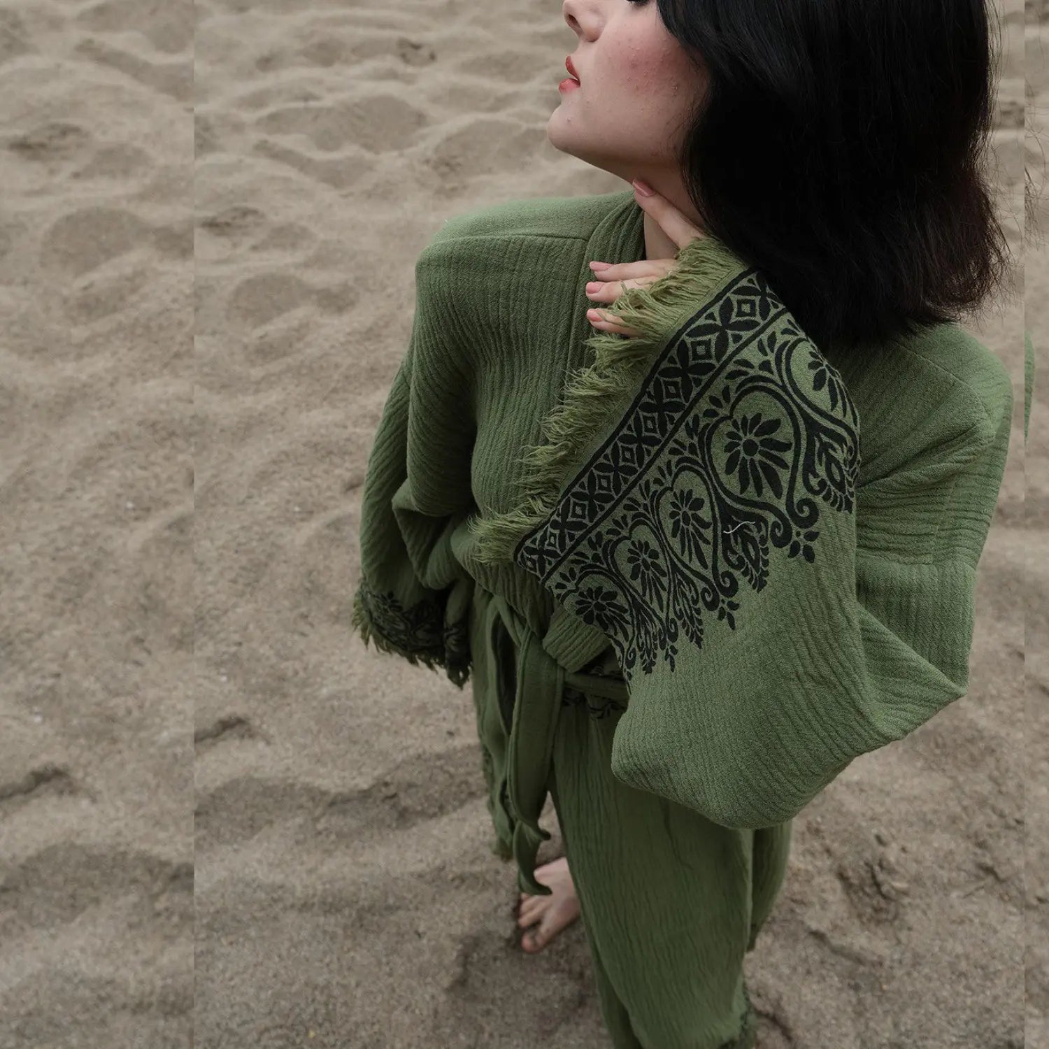 Detailed view of the intricate Indian motifs and high-quality cotton fabric used in the kimono.