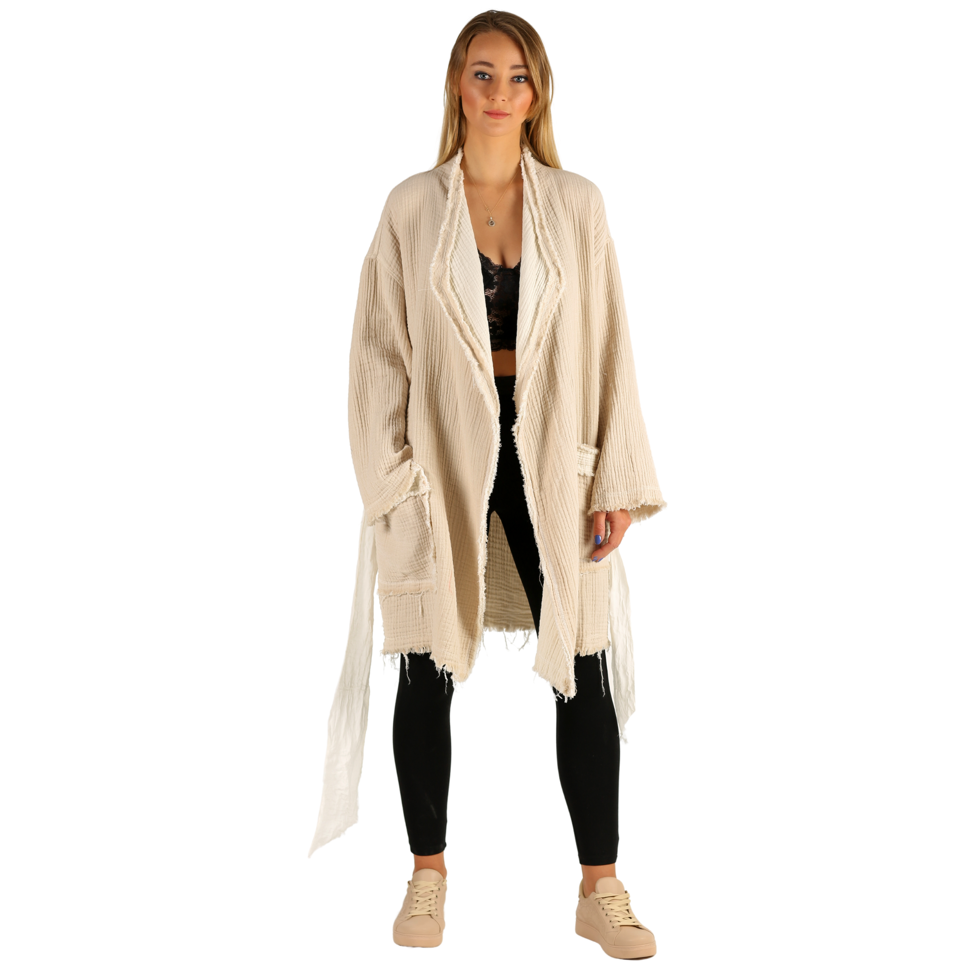 A girl wears natural color muslin jacket, open front, long sleeves,.