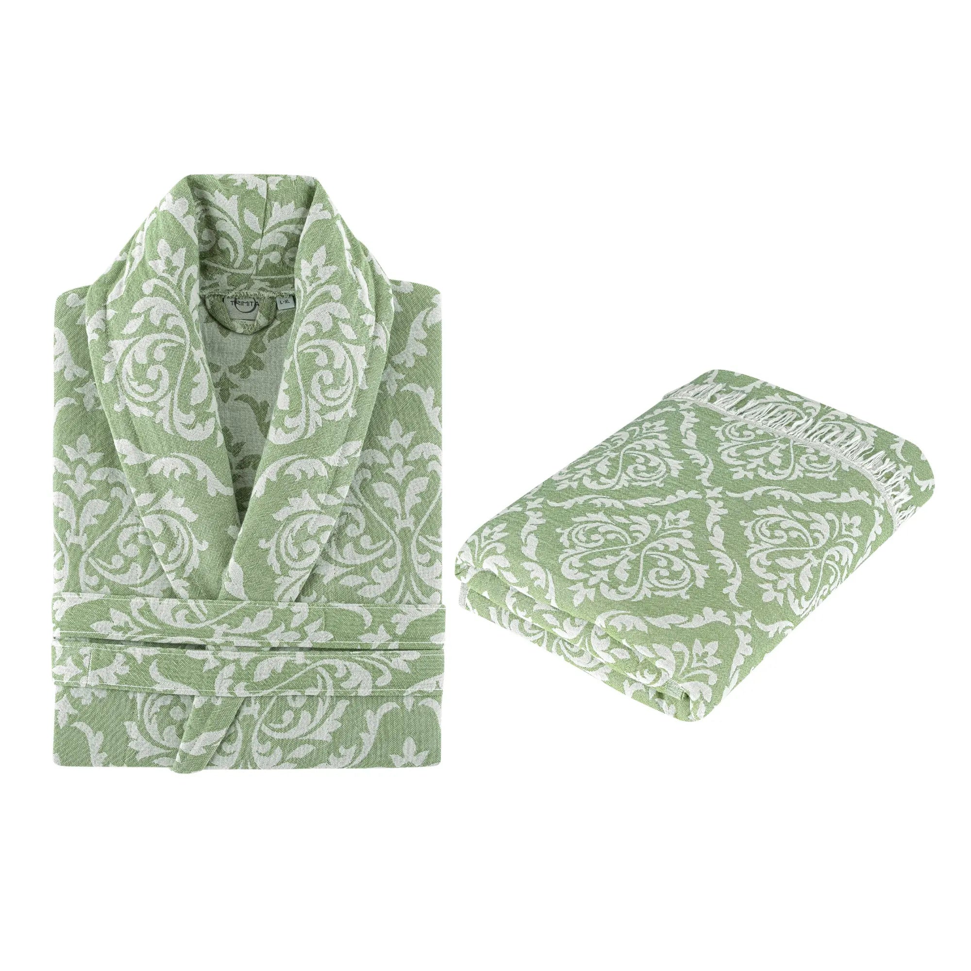 Folded green baroque pattern bathrobe with matching fringed towel, premium gift set by Trimita Home.