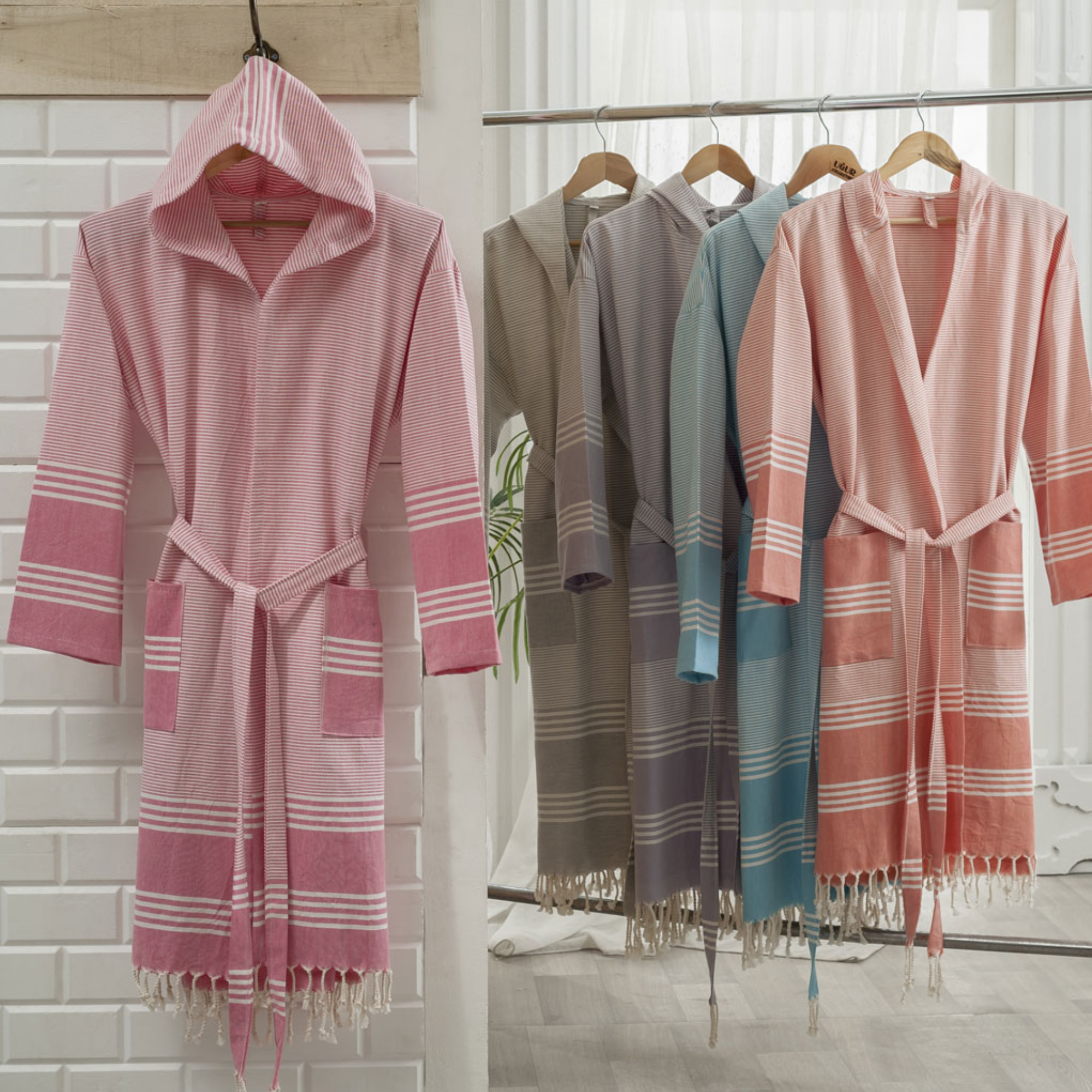 Striped hooded bathrobe by Trimita.