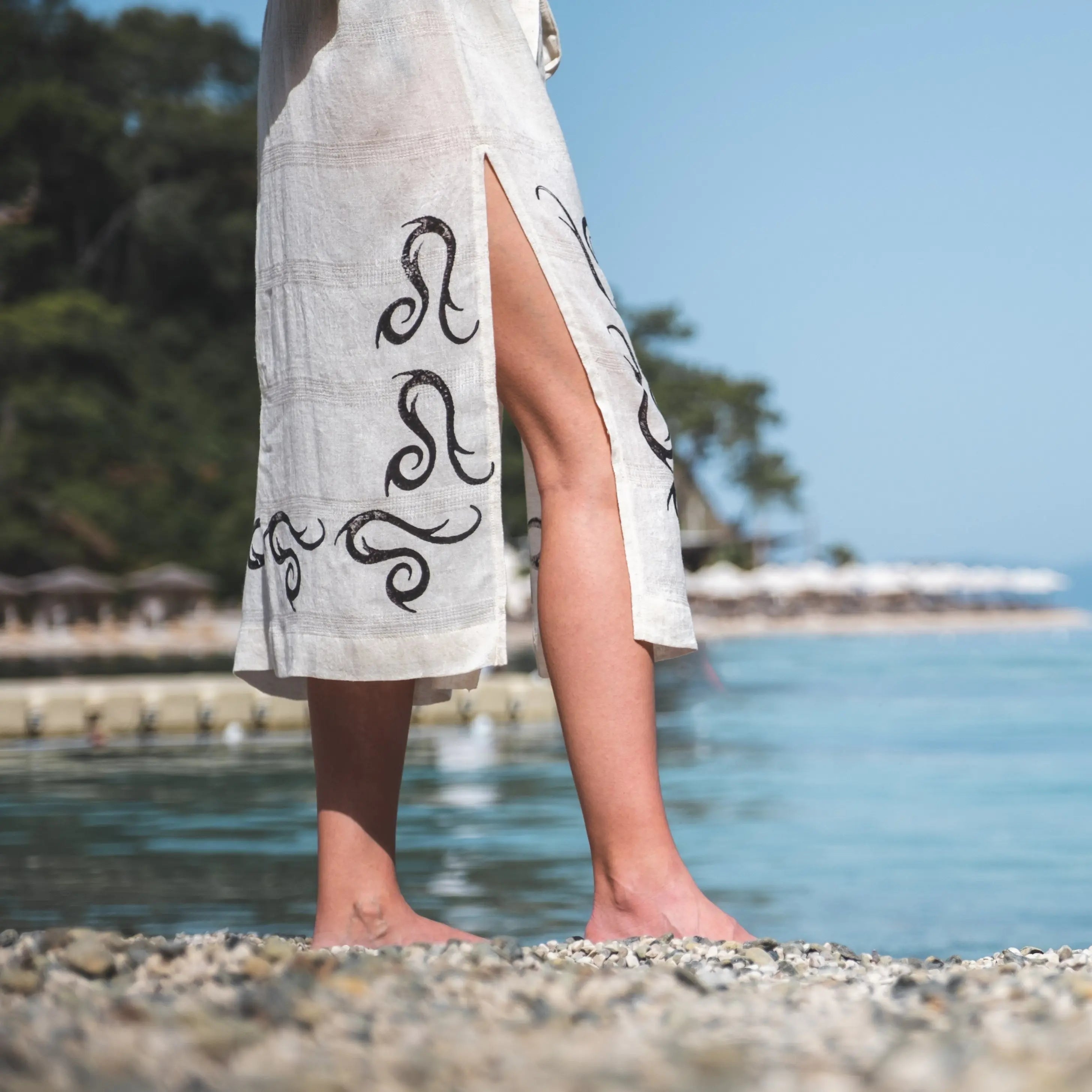 Handcrafted kimono made from a 70% linen, 30% cotton blend, dyed with natural root dyes and printed with linden tree blocks. The garment is one-size-fits-all, fitting sizes small through large.