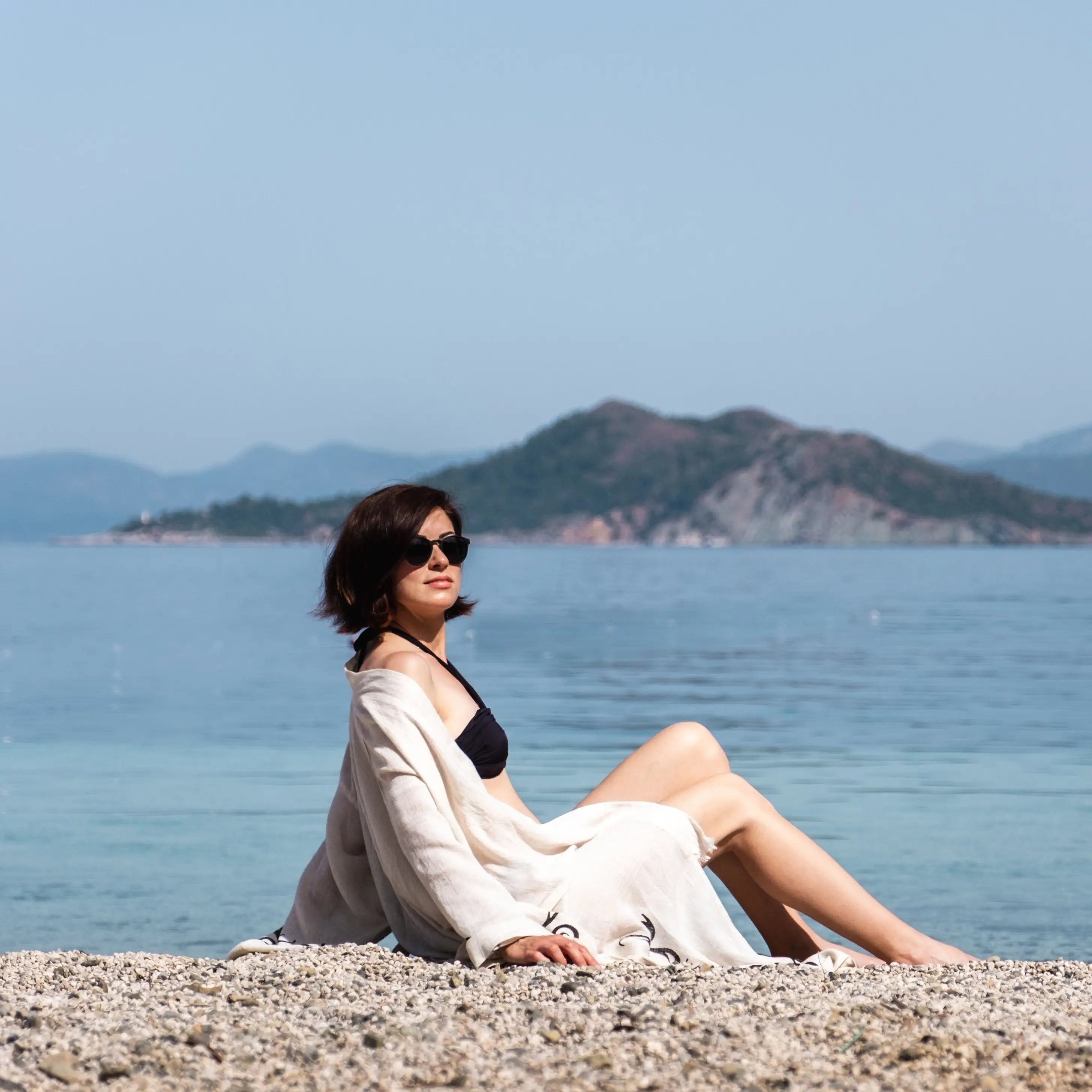 Handcrafted kimono made from a 70% linen, 30% cotton blend, dyed with natural root dyes and printed with linden tree blocks. The garment is one-size-fits-all, fitting sizes small through large.