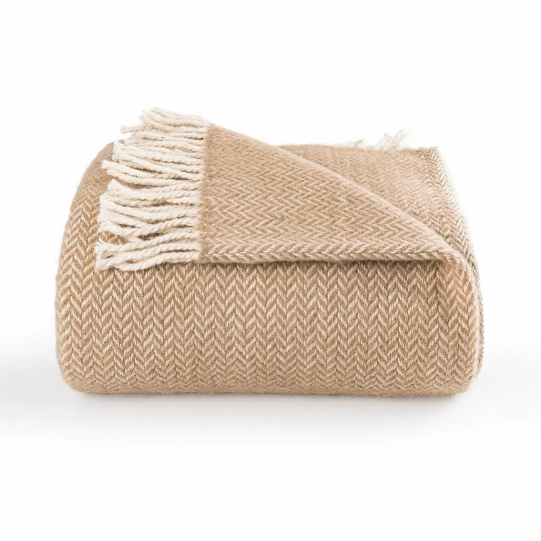 Trimita Wool Blanket Beige knitted blanket with white fringe on a white background