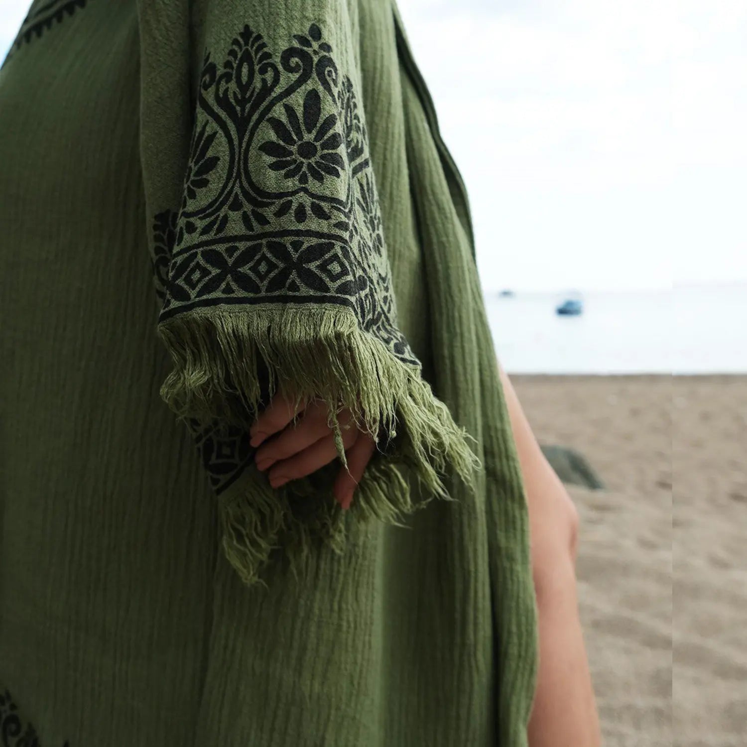 A stylish way to wear the Indian kimono, perfect for layering over casual and beach outfits.