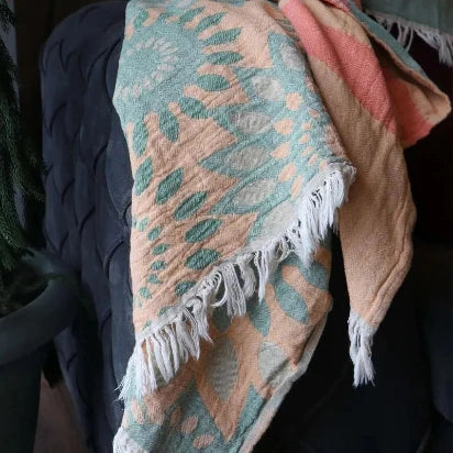Highly absorbent and quick-dry Trimita sunflower patterned cotton beach towel detail shot.